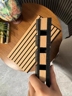A sound-insulating wooden panel that can be used in various scenarios such as living rooms, bedrooms and schools.